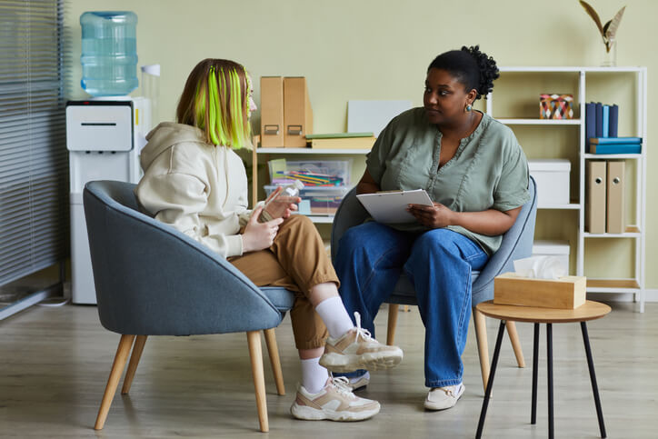 Support worker interacting with a client after community support worker training