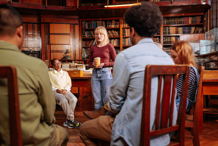 Student in community support worker training in a group session